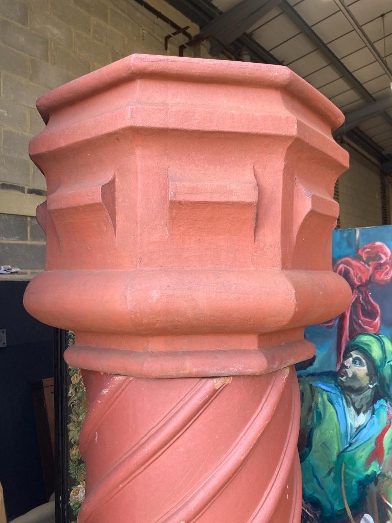 A 19th century Tudor style three-section terracotta chimney pot, height 203cm